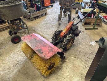 2-wheeled tool carrier with broom