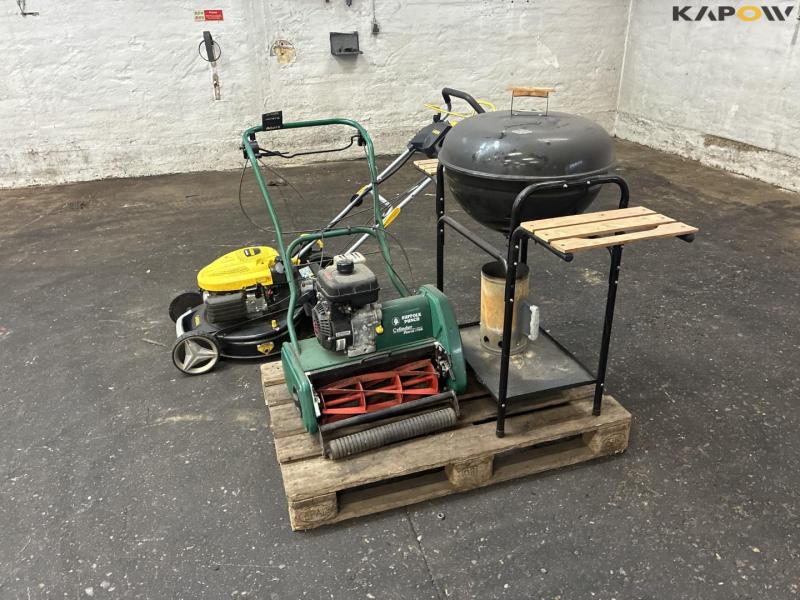 2 lawn mowers and grill 8
