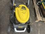 2 lawn mowers and grill 18