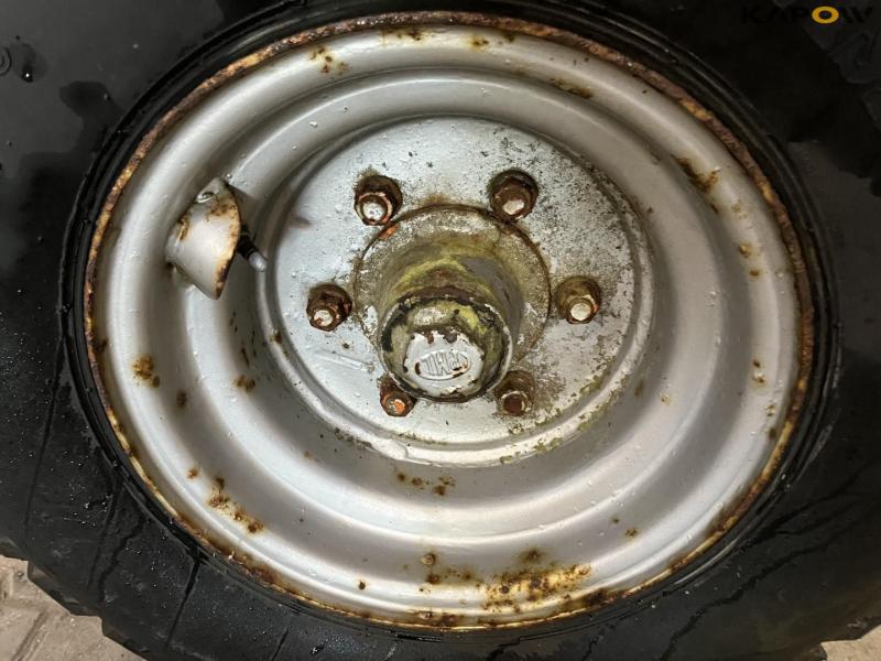 Axle with 14.0/65-16 10