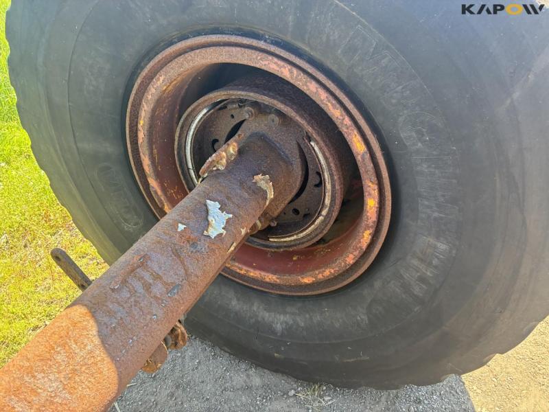 Axle with wheels 16
