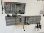 Arm with compressed air roller, cable roller, tool board 27