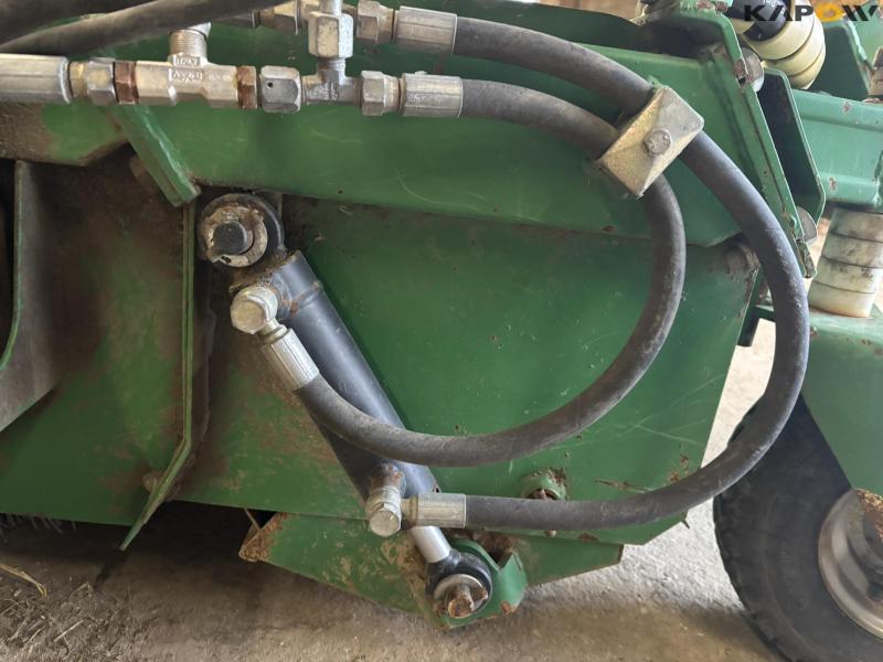 Avant sweeper with collector 22