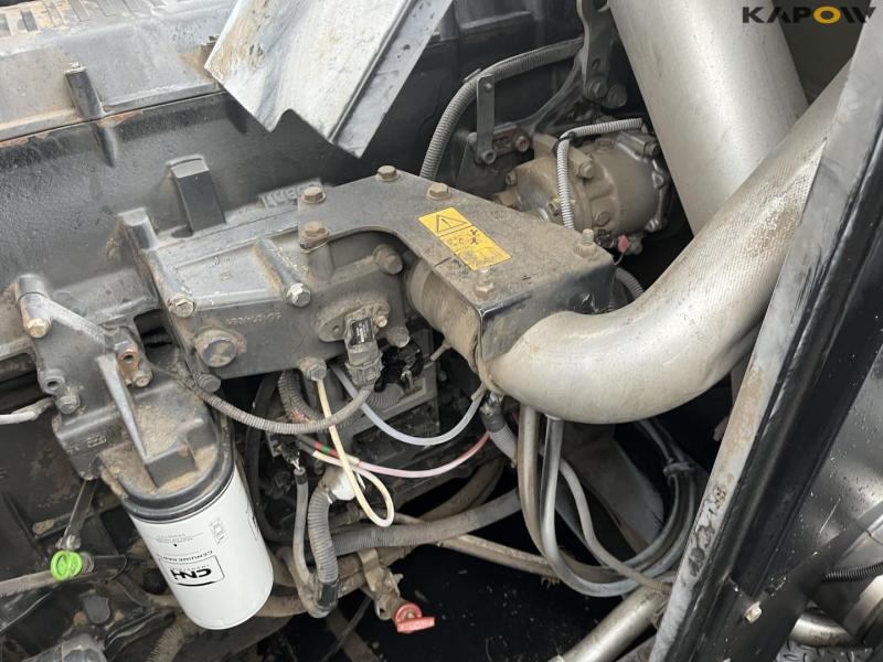 Case IH AFX8010 combine with 35-foot D60-S Macdon header 50