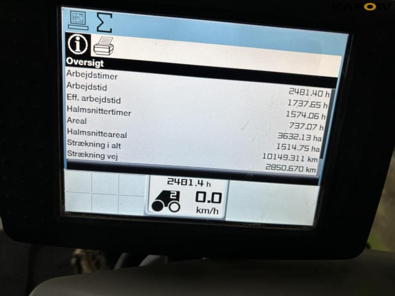 Claas 670 combine with V900 30ft header 140