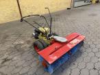 Clio tool carrier with broom 3