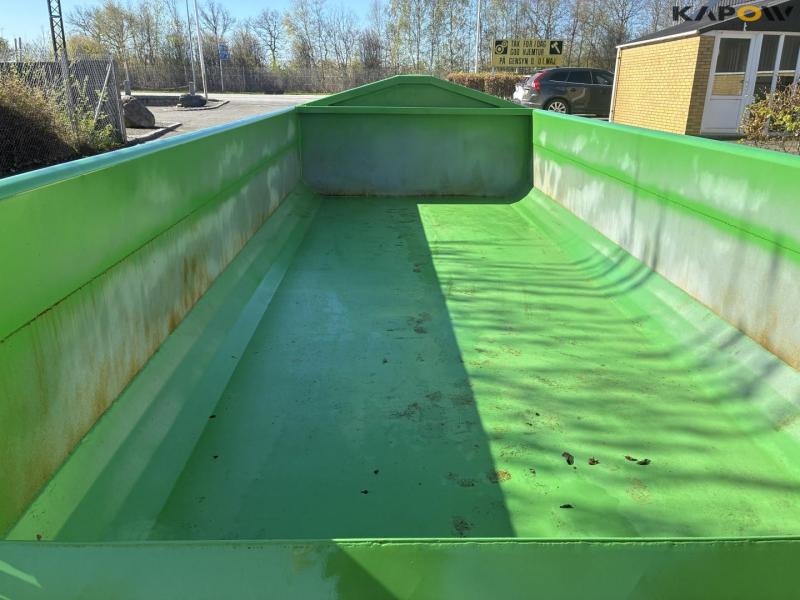 Container for hook and wire 26