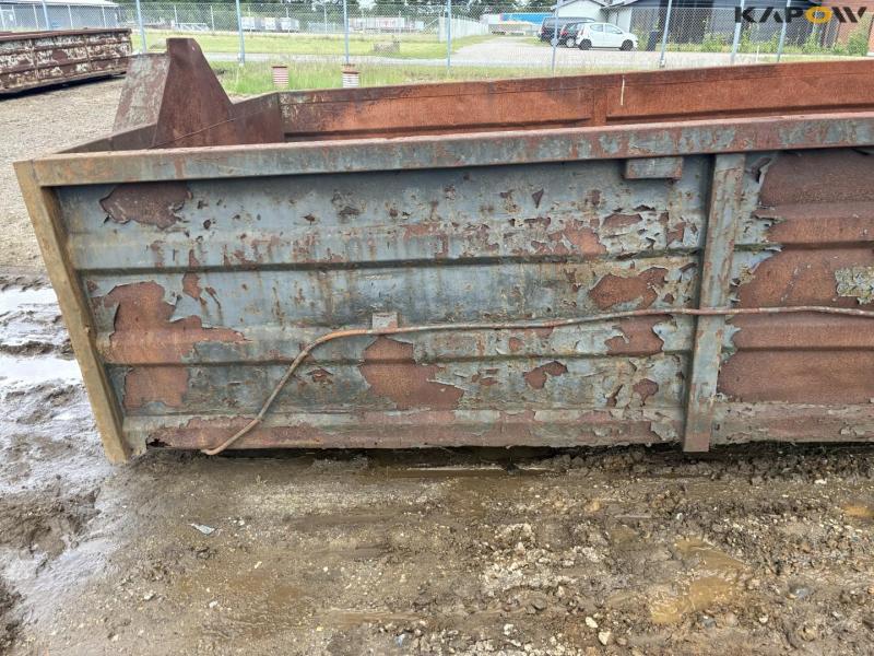 Container for hook and wire 26