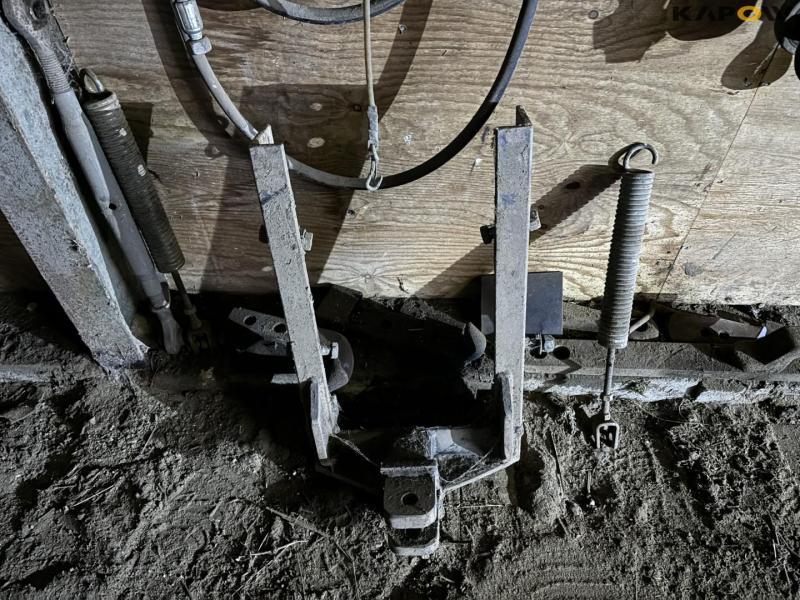 Various parts on wall 30