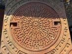 Square manhole frame with round cast iron covers 21