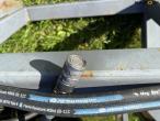 Hydraulic feed hose reel 18