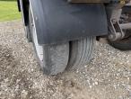 Straw wagon with hydraulic bale securing 38