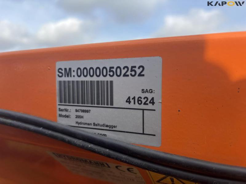 Holder C 2.34 with sweeper and salt spreader 63