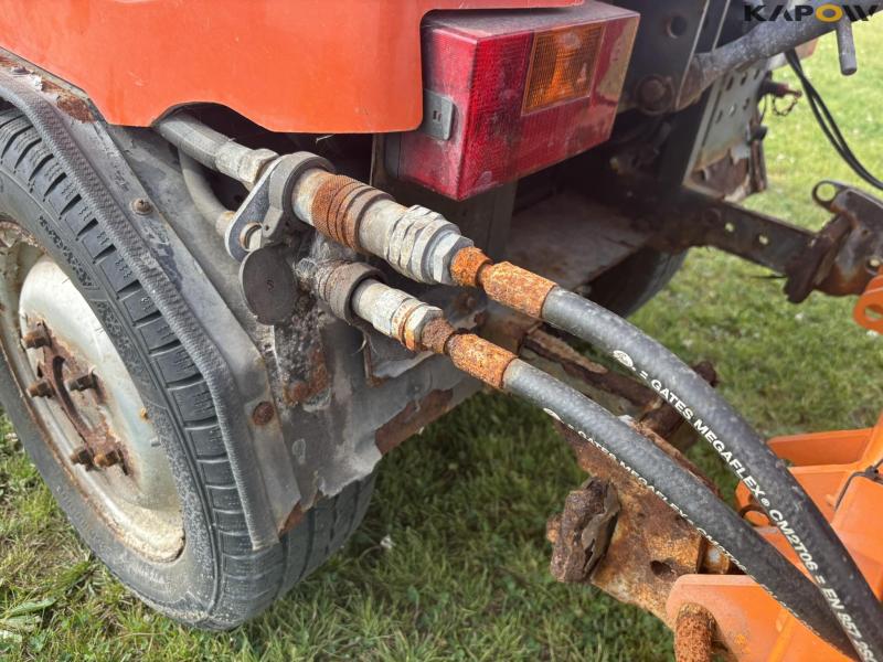 Holder C 2.34 with sweeper and salt spreader 64