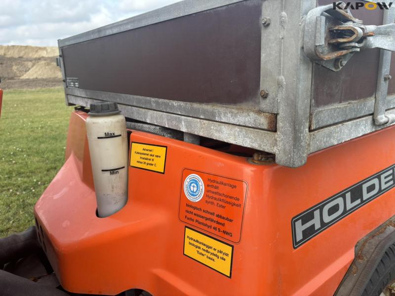 Holder C 2.34 with sweeper and salt spreader 73