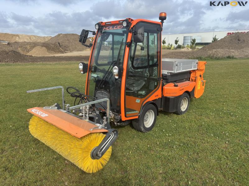 Holder X45 with sweeper and salt spreader 1