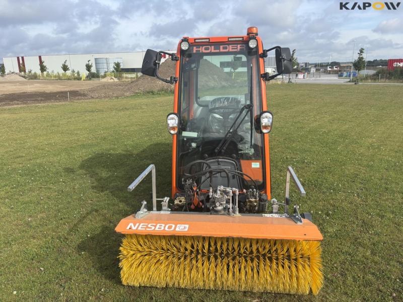 Holder X45 with sweeper and salt spreader 2