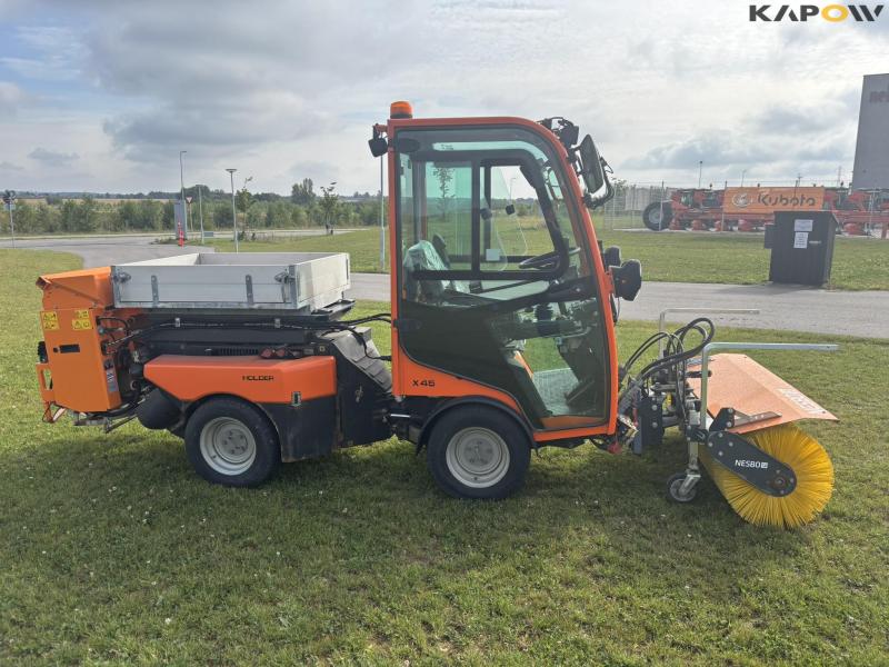 Holder X45 with sweeper and salt spreader 4