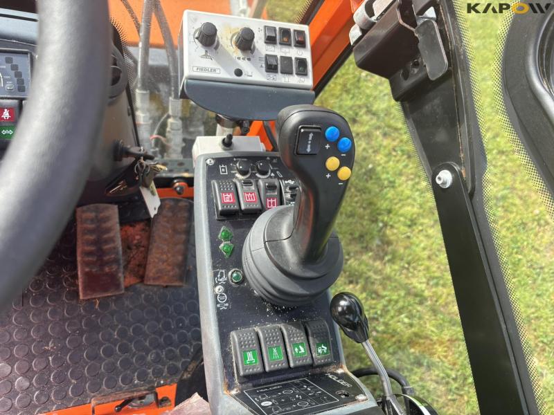 Holder X45 with sweeper and salt spreader 79