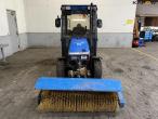 Iseki 318 compact tractor with broom and scraper blade 2