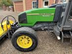 John Deere 3200 tractor with broom 9