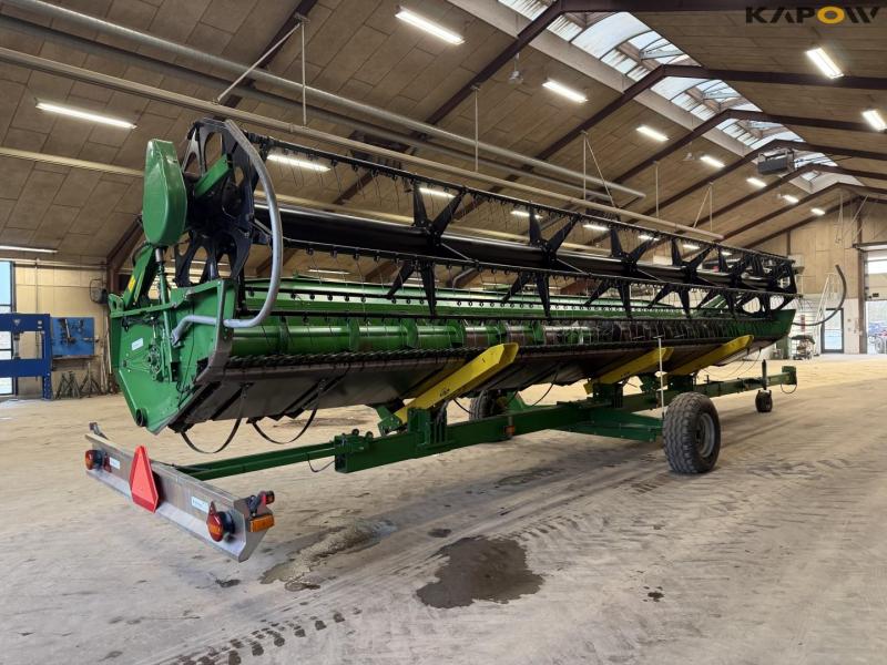 John Deere T660i with 30 foot header 66