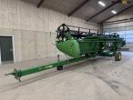 John Deere T660i with 30 foot header 63