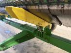 John Deere T660i with 30 foot header 83