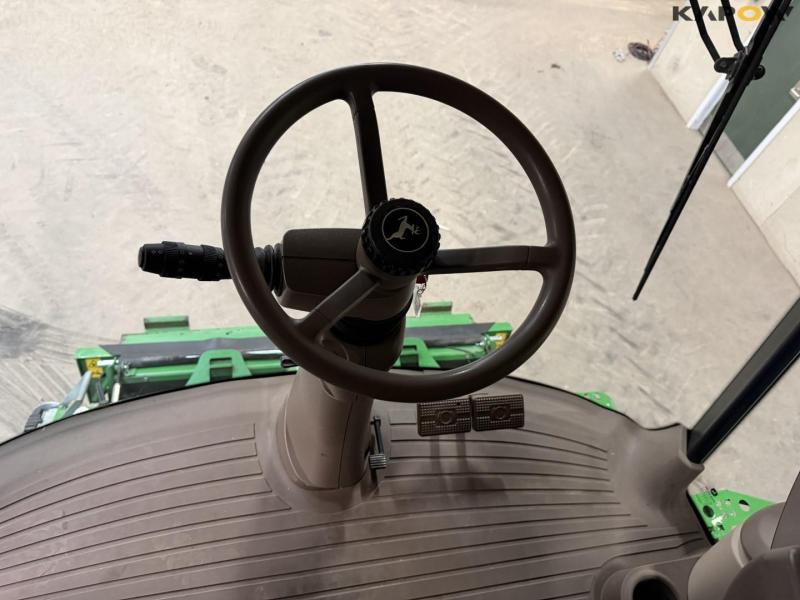 John Deere T660i combine with 30ft draper header 12