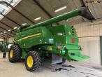 John Deere T660i combine with 30ft draper header 6