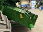 John Deere T660i combine with 30ft draper header 71