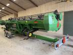 John Deere T660i combine with 30ft draper header 90