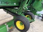 John Deere T660i combine with 30ft draper header 96