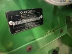 John Deere T660i combine with 30ft draper header 108