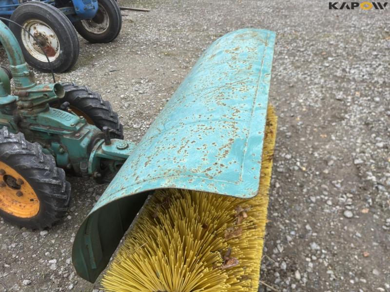 JRUS tool carrier with broom, scraper and sulky 12