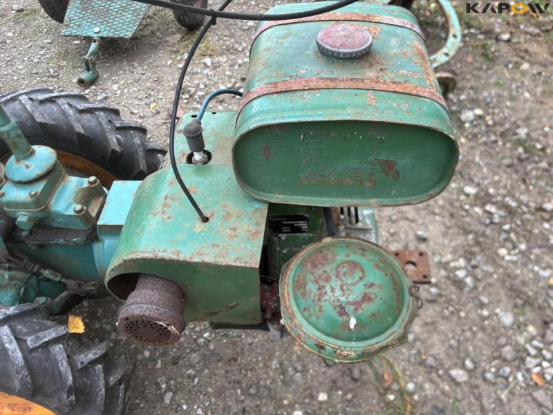 JRUS tool carrier with broom, scraper and sulky 27