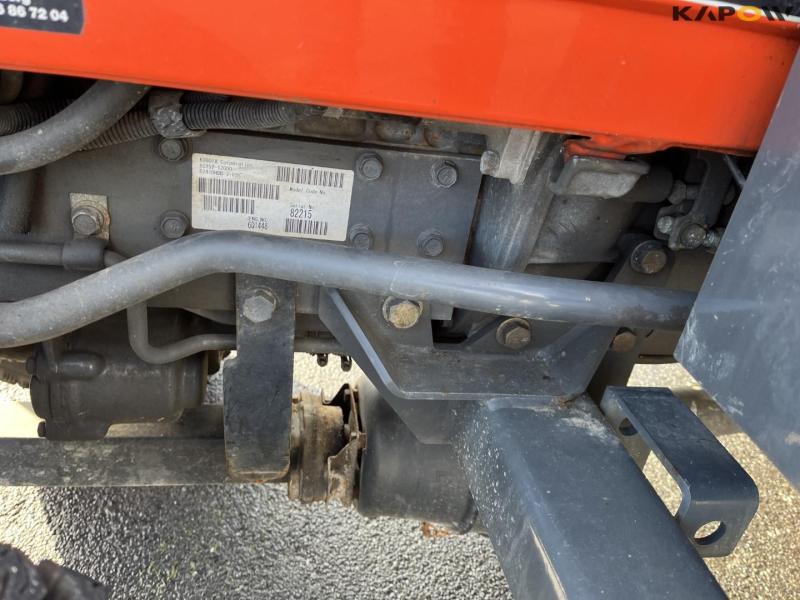 Kubota B2410 compact tractor with sweeper and salt spreader 24