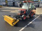 Kubota B2410 compact tractor with sweeper and salt spreader 1