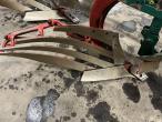 Kverneland EG100 6 furrow reversible plough with soil packers 18