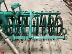 Kverneland EG100 6 furrow reversible plough with soil packers 20