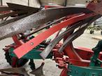 Kverneland EG100 6 furrow reversible plough with soil packers 24