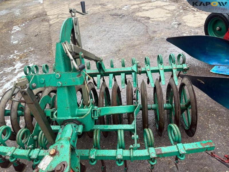 Kverneland LD 100 reversible plow with Packomat S  23