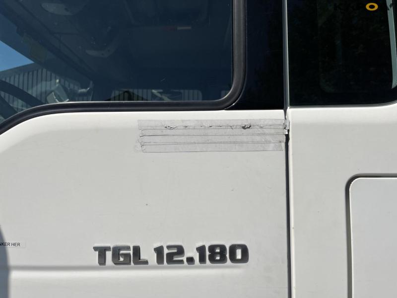 Man TGL 12,180 truck with Versalift VT-145-f lift 48