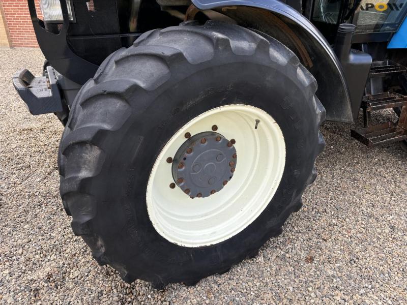 New Holland 8560 tractor with Hauer P-O-M S150 front loader 73