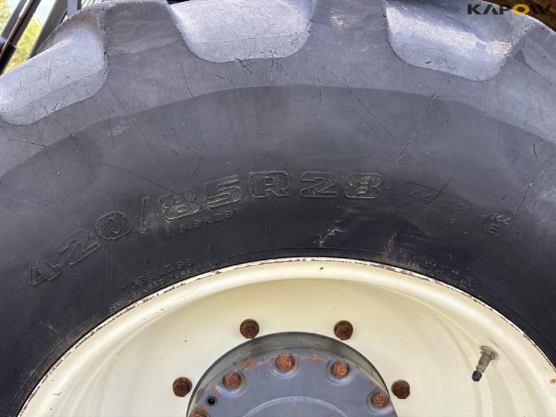 New Holland 8560 tractor with Hauer P-O-M S150 front loader 75