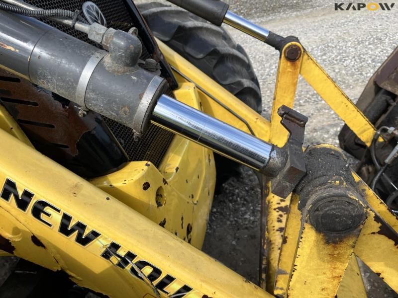 New Holland B115B backhoe loader 23