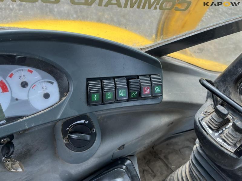 New Holland B115B backhoe loader 49