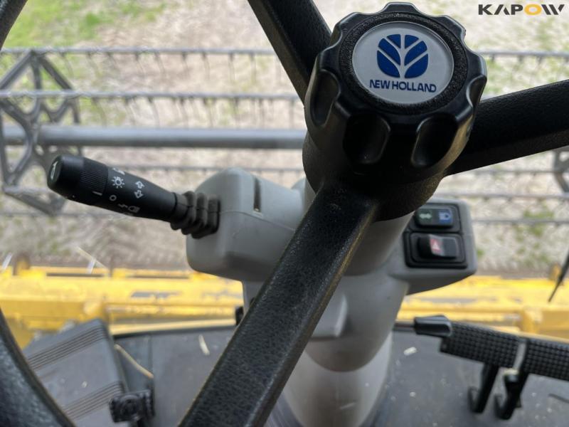New Holland CX840 combine with 24 foot header 58