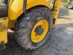 New Holland LB115B-4PS backhoe loader 56
