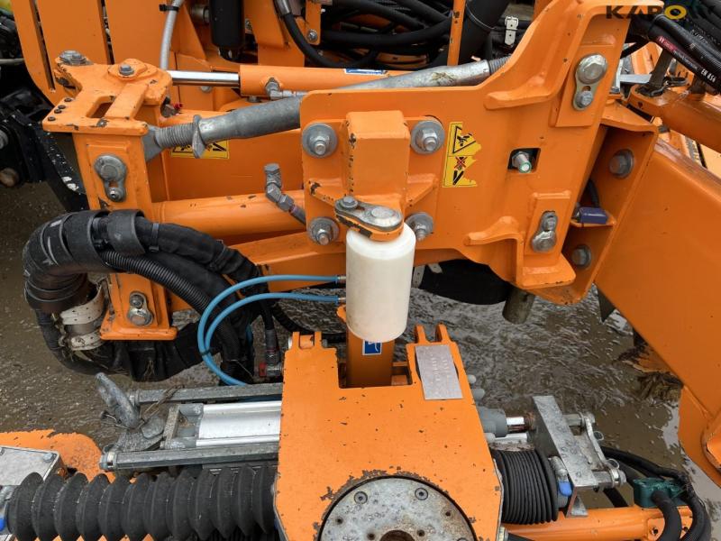 New Holland T6.150 tractor with Mulac arm mower 62